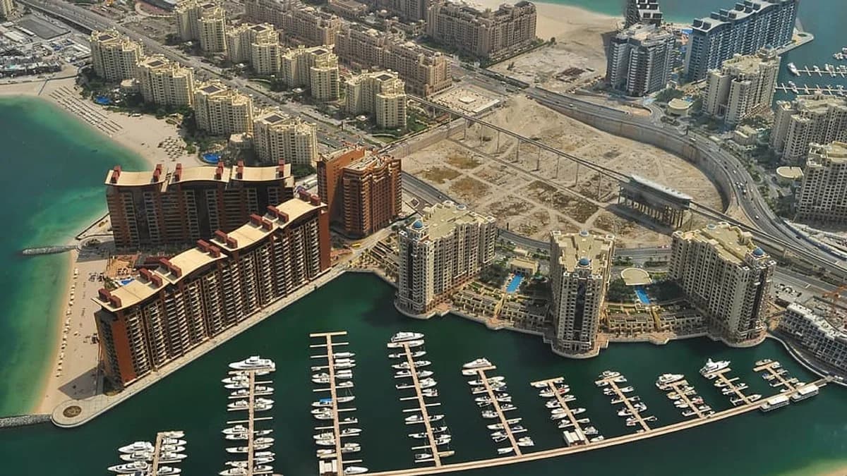 Aerial view of Palm Jumeirah luxury villas and coastline in Dubai